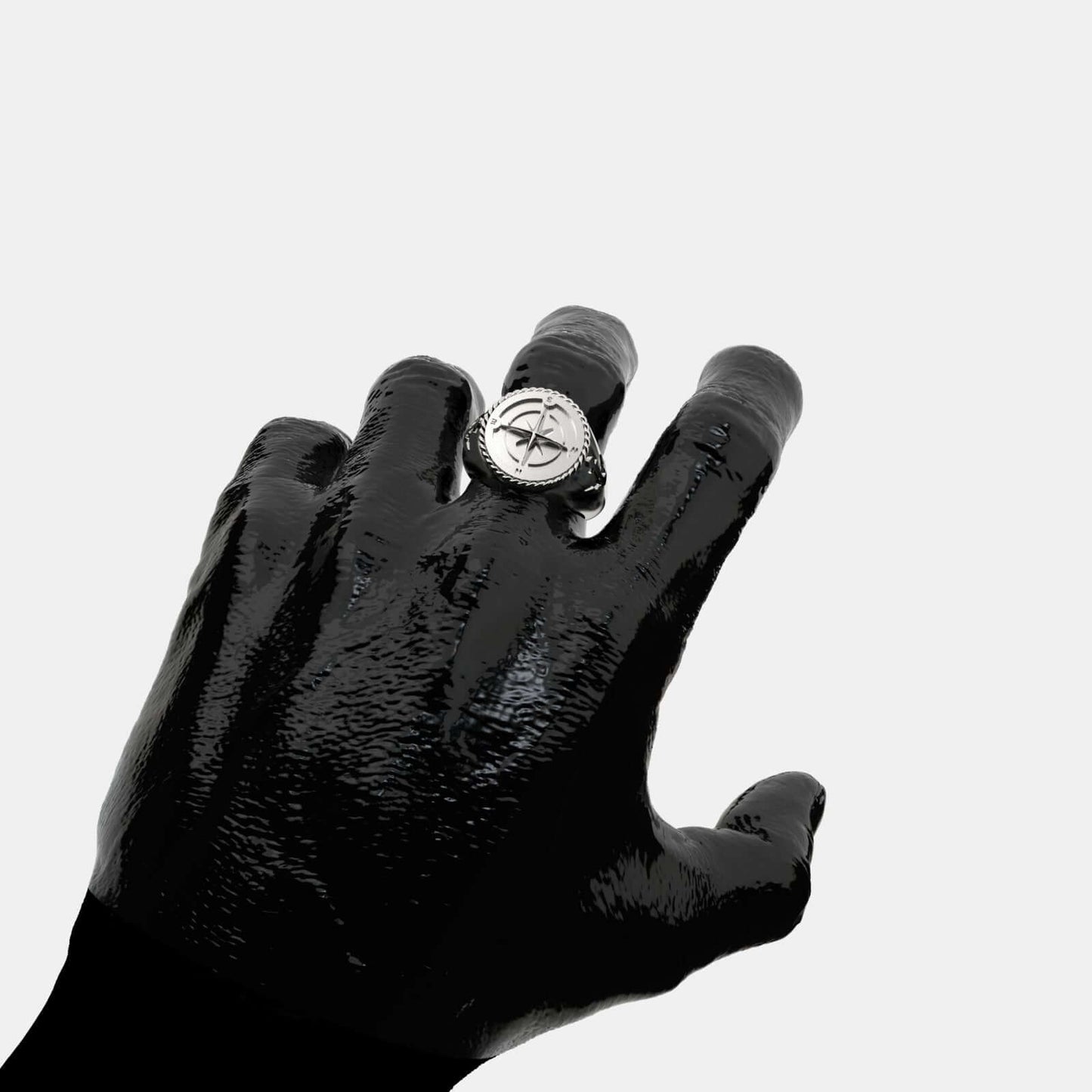 Elegant Coordinates Silver Ring displayed on a black hand, showcasing its unique design and craftsmanship.